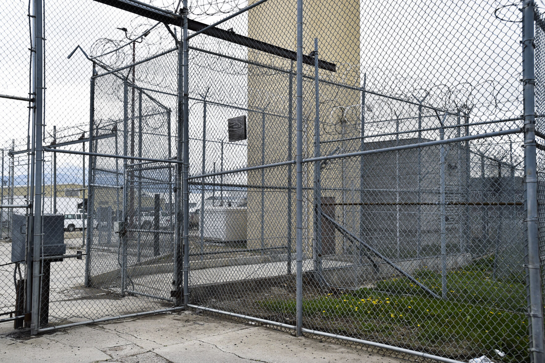 A system of multi-layer fencing and gates divides Montana State Prison